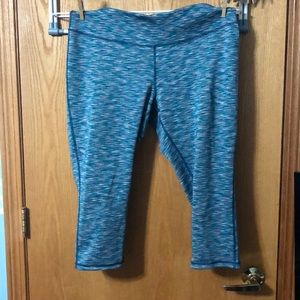Reversible teal and pink athletic leggings
